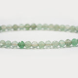 Serene Heart – Green Strawberry Quartz & Lotus Bracelet